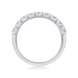 Silver ring with small diamonds on a white background