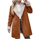 Brown suede coat with white fur lining worn by a person on a white background