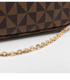Brown patterned handbag with a gold chain on a white background