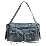 Gray handbag with drawstring details on a white background
