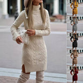 Woman wearing a beige cable knit sweater dress with a blurred background