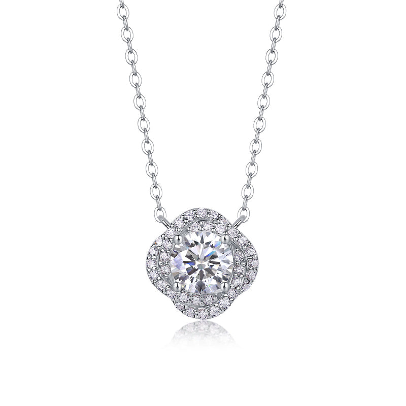 Silver necklace with a round diamond pendant on a white background