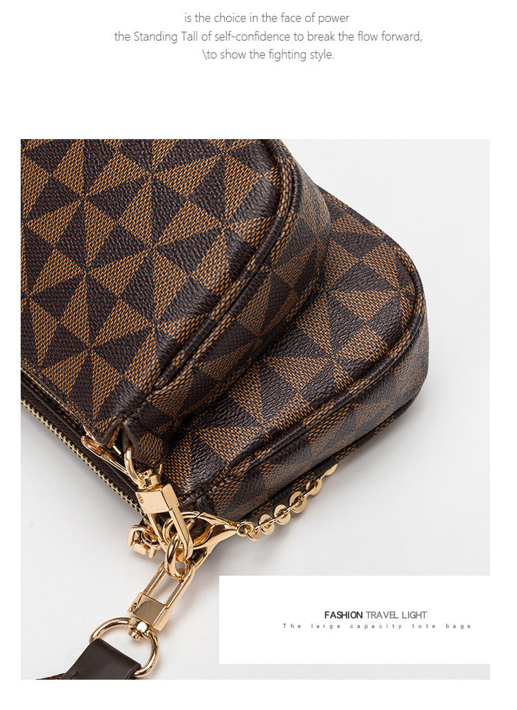 Brown patterned handbag with gold chain on a white background