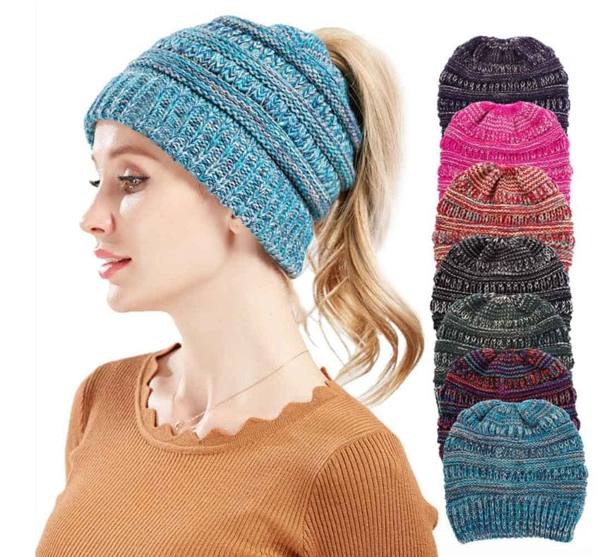 Knitted headband worn by a person with additional headbands displayed in a stack.