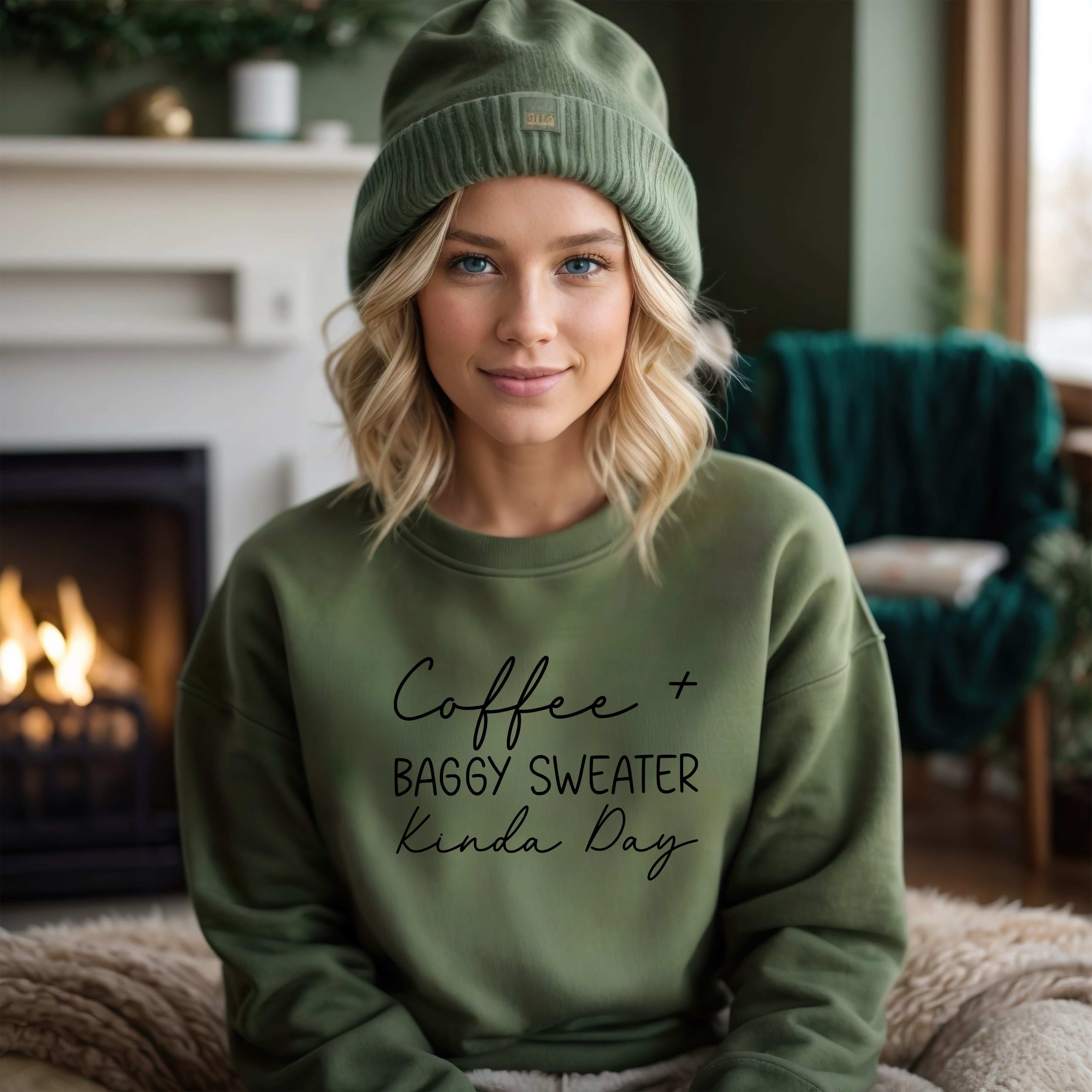 Woman wearing a green sweatshirt with text in a cozy indoor setting