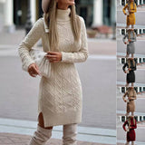 Woman wearing a beige cable knit sweater dress with a blurred background