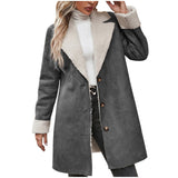 Gray coat with white fur lining worn by a person on a white background