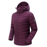 Purple puffer jacket with a hood on a white background